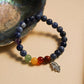 Lapis Lazuli 7 Chakra Bracelet with Hamsa Charm