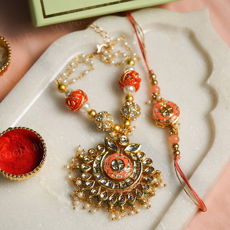 White & Orange Pearl Bhaiya Bhabhi Rakhi