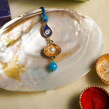 Evil Eye Golden Shell Bhabhi Rakhi